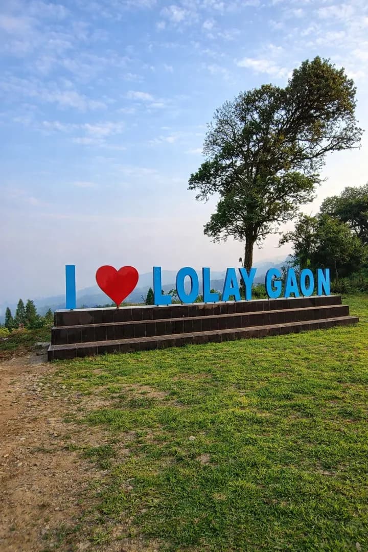 Lolaygoan Eco Park walkway surrounded by trees near Kaffer Gaon