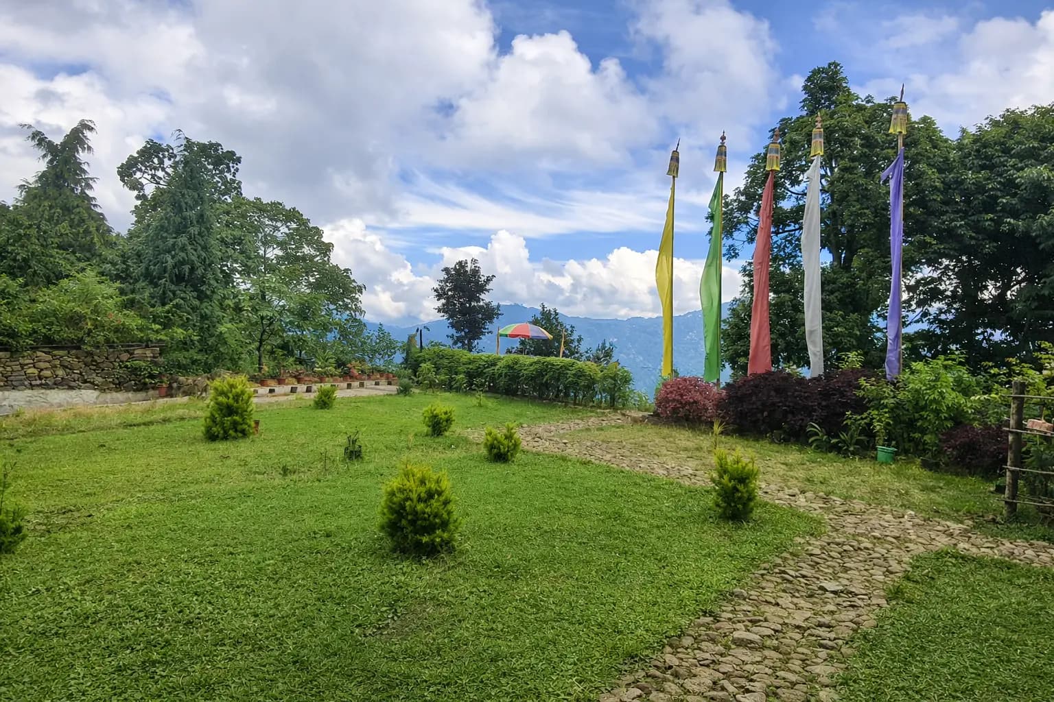Dramatic cloudy mountain view surrounding Rigsel Homestay, Kalimpong