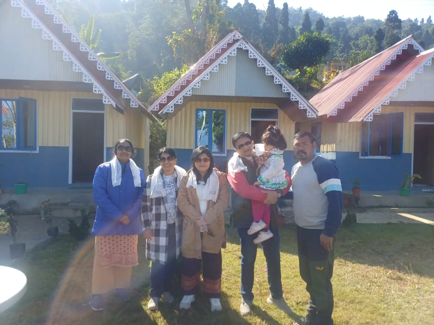 Guests relaxing with scenic views at Rigsel Homestay, Kalimpong