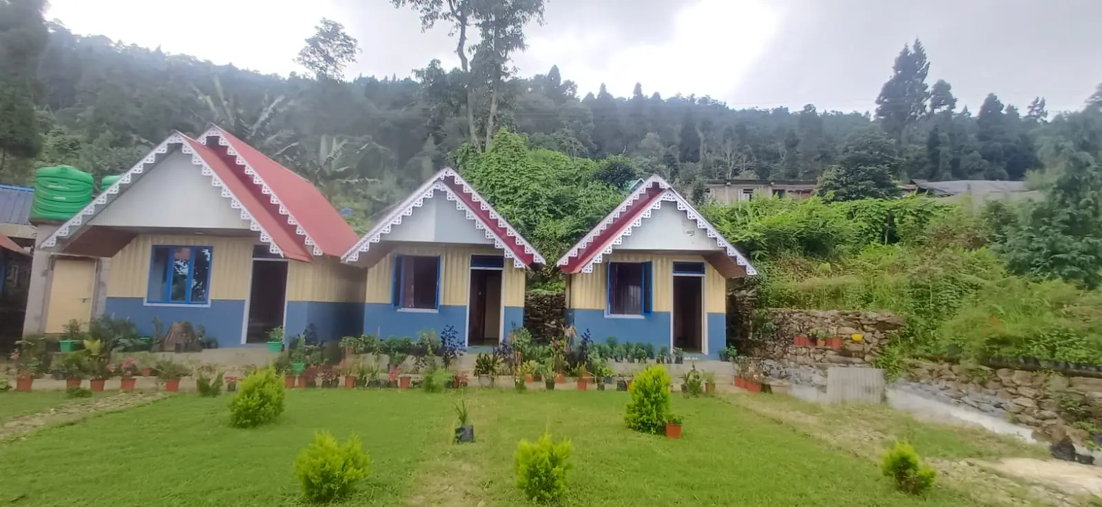 Rolling hill views and green terraces near Rigsel Homestay, Kaffer Gaon