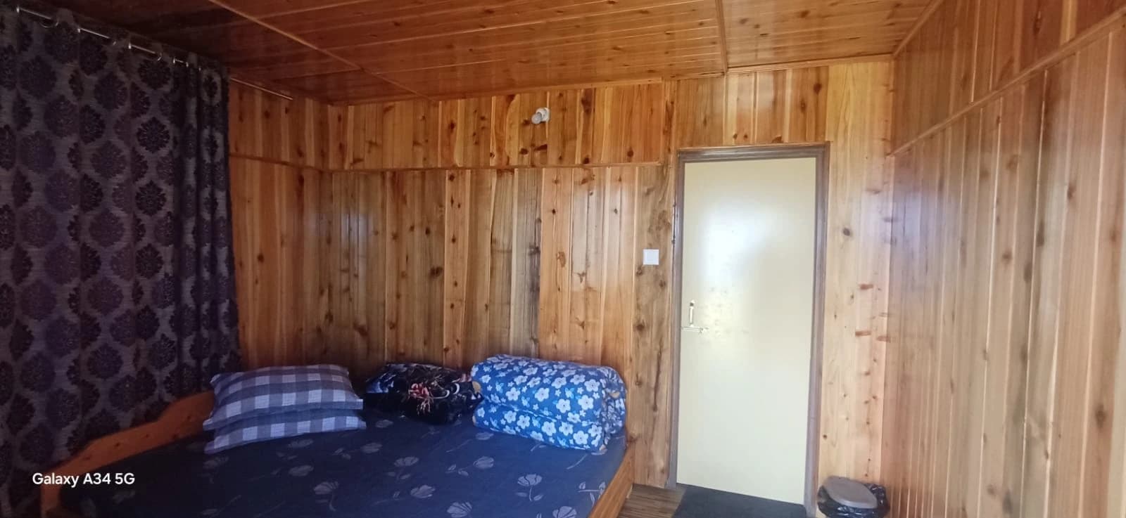 Family four-bed room at Rigsel Homestay, ideal for group stays