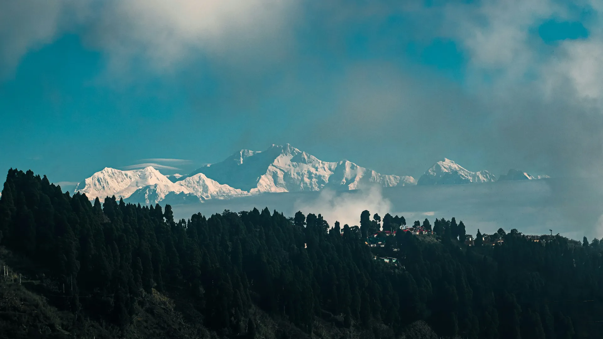 Golden sunrise over the misty valleys of Kaffer Gaon, Kalimpong